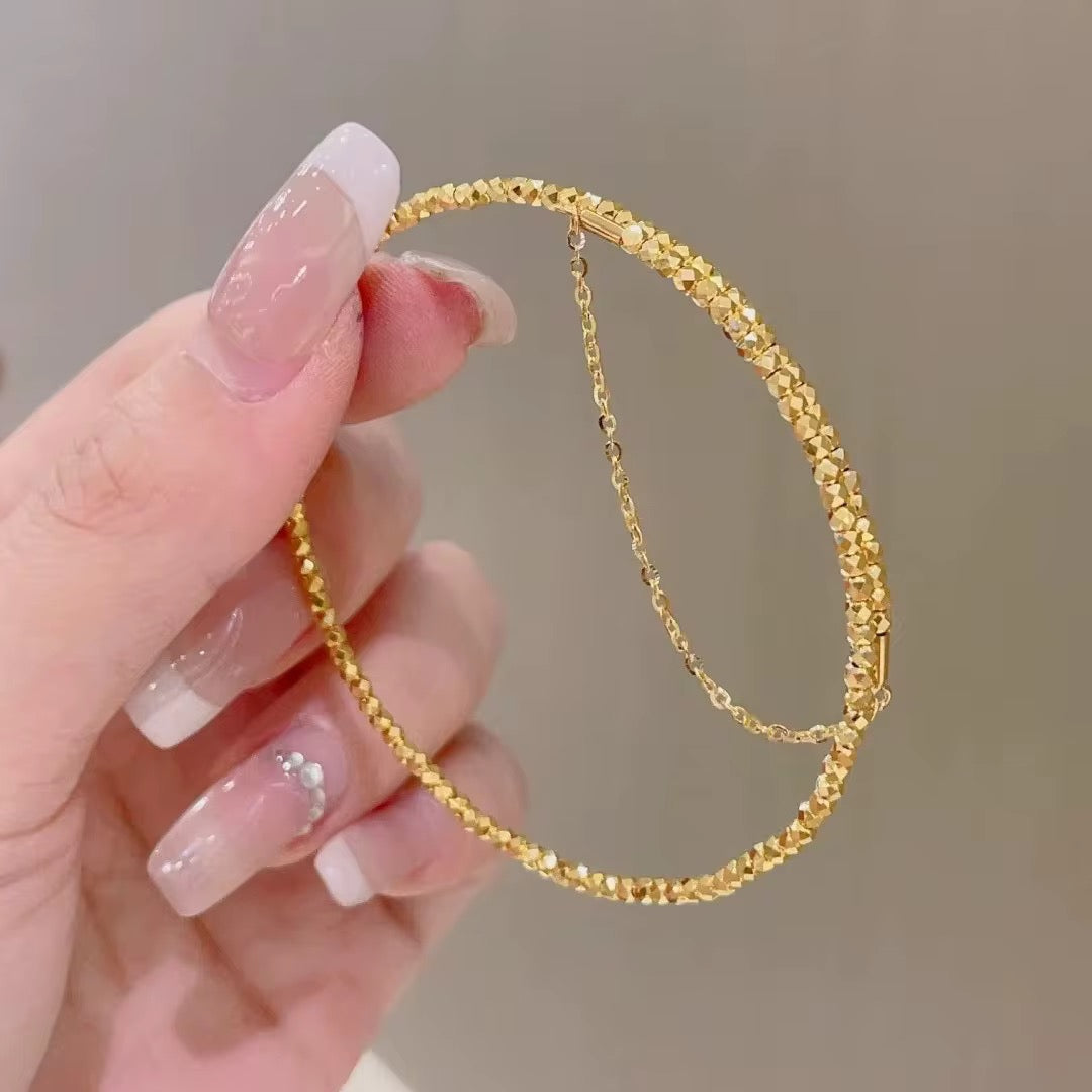 18K Gold Textured Adjustable Bangle with Safety Chain – Delicate & Elegant